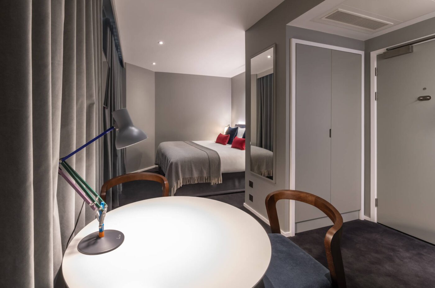 King sized room with a double bed, separate dining area and built in wardrobe.