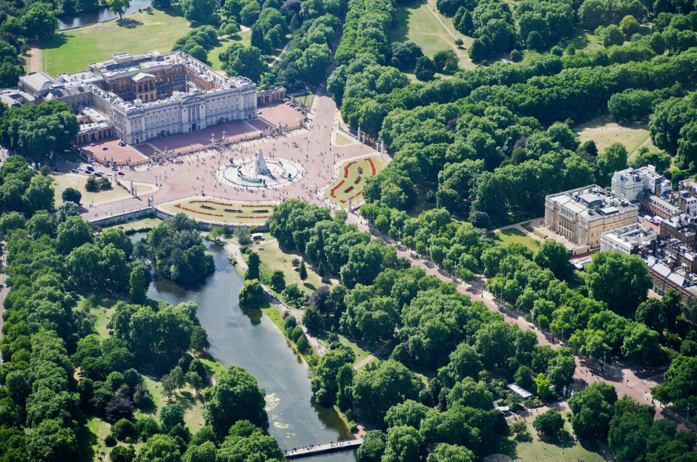 An Aerial View of London Landmarks and Skyline on a Sunny Day Featuring Buckingham Palace, The Mall
