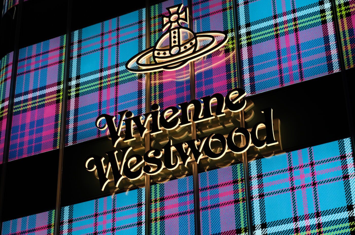 A wicked sign on a building.